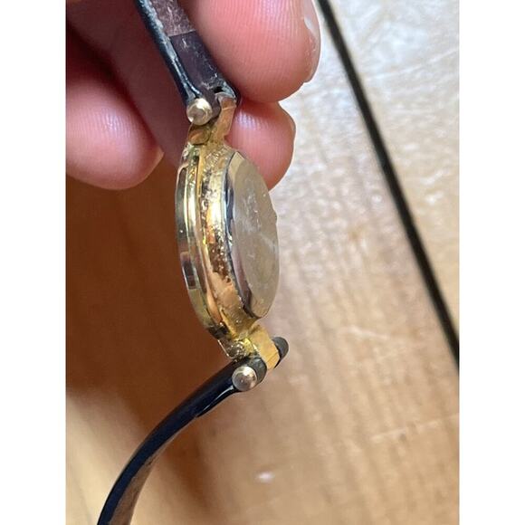 Women's GITANO Gold Tone Abalone Shell Dial Watch, Black Band. Roman numerals - Picture 6 of 9